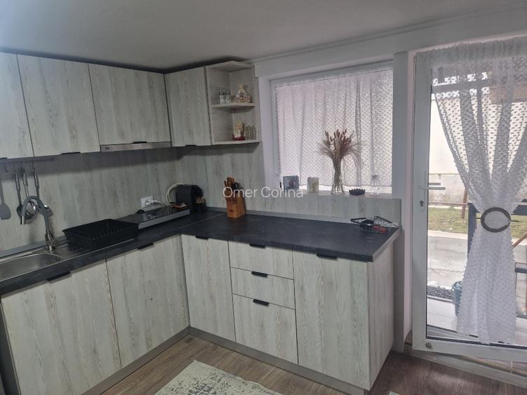 De închiriat apartament cu 3 camere la et 1 si o garsoniera la parter,imobil cas - 7