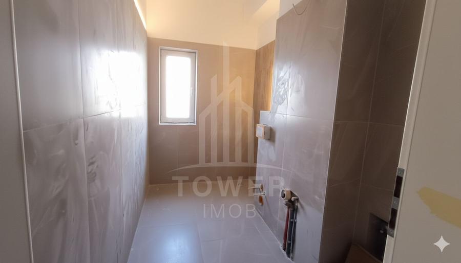 Apartament cu trei camere si gradina proprie
