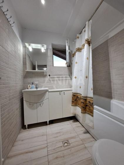 Apartament cu 2 dormitoare + living cu bucatarie, parcare subterana