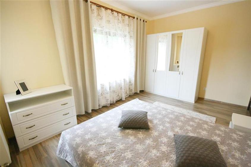 Apartament central cu acces la gradina si 2 locuri parcare