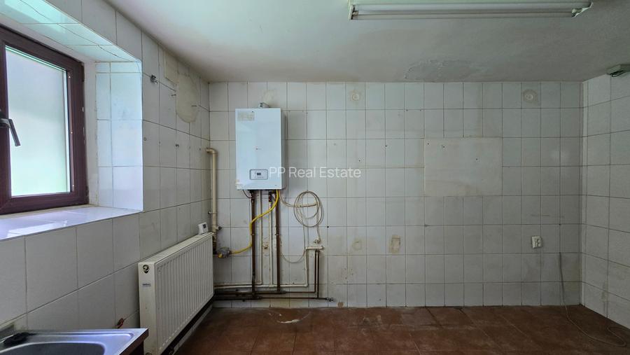 Strada Mircea cel Batran - Casa demisol (58mp)+parter (69mp) /teren 150 mp - 17