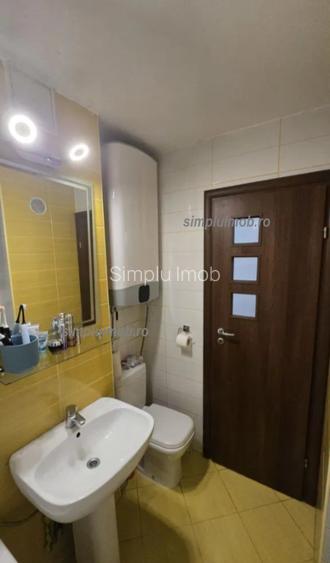 Metrou Titan decomandat spatios 2 camere - 12