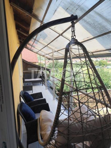 Casa cu garaj si curte de vanzare 147 mpu in Sura Mare - 11