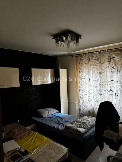 Apartament cu 3 camere , str. Bozieni - 12