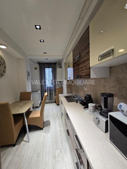 Aparatorii Patriei-3 cam,decomandat,et. 1,supr. 90 mp. loc parcare,an 2017 - 10