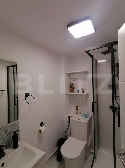 Garsoniera moderna tip studio, 25 mp, Semicentral, cu loc de parcare
