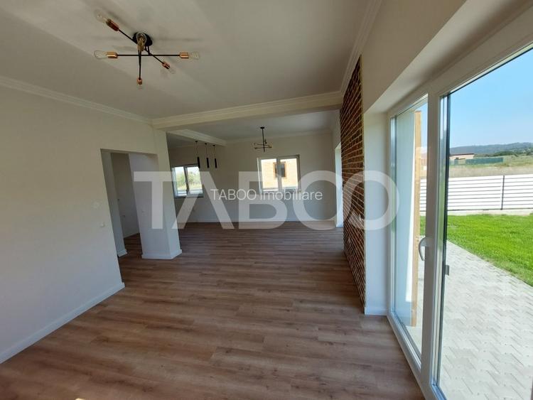 Casa de vanzare 4 camere 3 bai 119 mp cu teren 470 metri in Talmaciu - 9