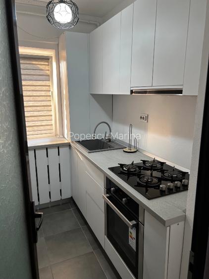 Vând garsoniera complet mobilata si utilata - 9