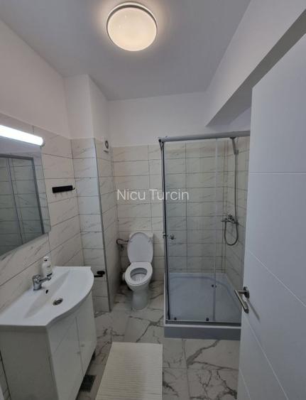 Inchirez garsoniera moderna cu parcare privata - 3
