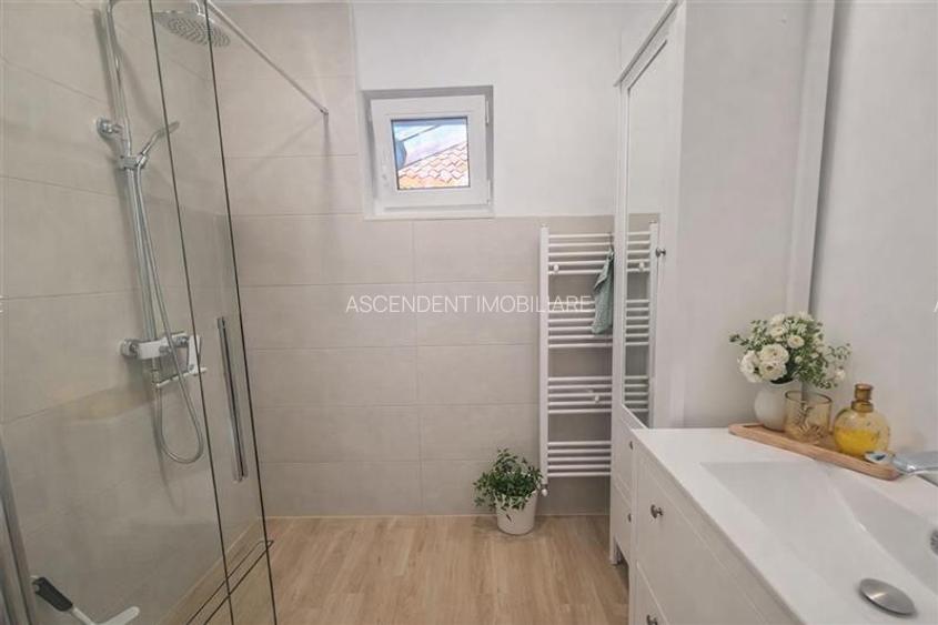 Casa situata central, cu un echilibru remarcabil intre traditie si design contem - 11