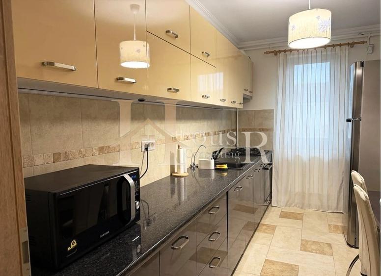 Strada asfaltata. Bucatarie inchisa. Decomandat. - 10