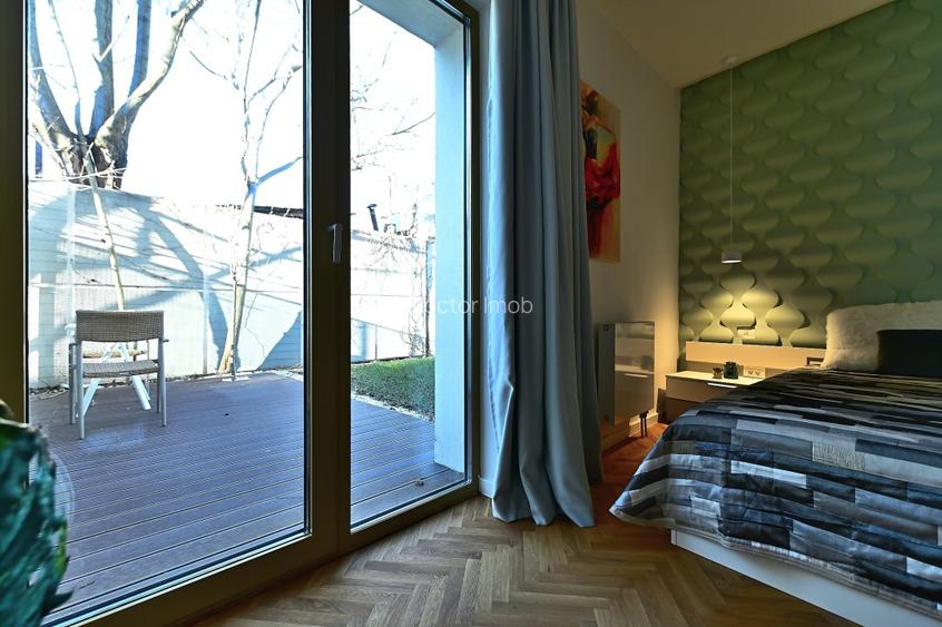 Rafinament, liniște și spațiu exterior privat în centrul Bucureștiului - 23