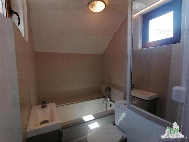 Apartament mansardabil de vanzare