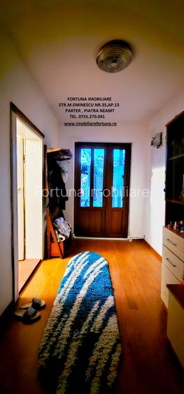 Casa individuala,cu 2 beciuri, anexe si 920 mp teren,la 10 minute de P.Neamt - 15