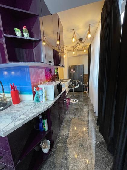 Vă propune spre vânzare un apartament 2  camere  complet mobilat - 11