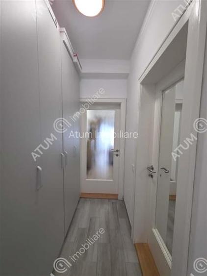 Garsoniera decomandata cu balcon si parcare in zona DaVinci din Sibiu - 13