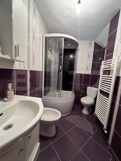 Casa pe 3 nivele si 13 arii teren