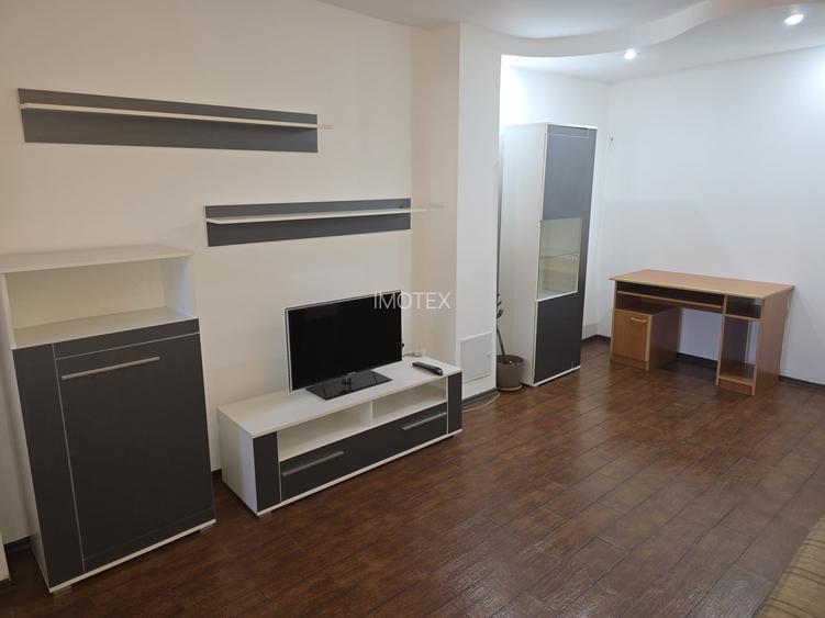 Garsoniera moderna transformata in doua camere in Gavana / Lumina - 5