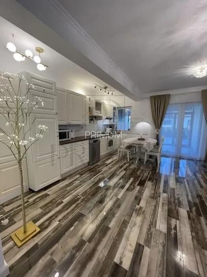 Apartament in casa insiruita - zona buna - mobilat utilat - curte amenjata - 2