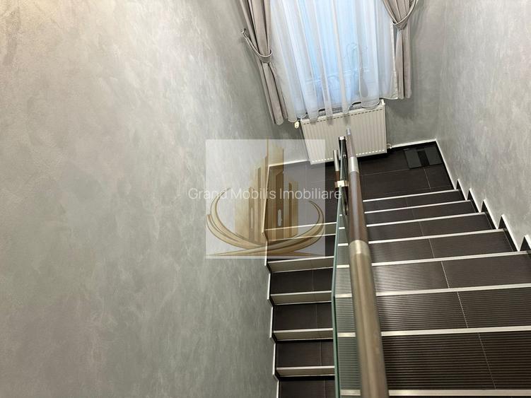 Casă premium cu panouri solare, stație EV, anexă locuibilă și grădină - 18