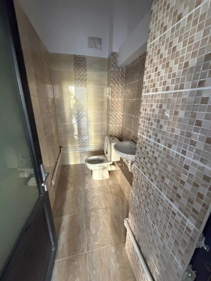 Spatiu comercial, 100 mp, zona centrala din Filiasi cu deschidere in Racoteanu