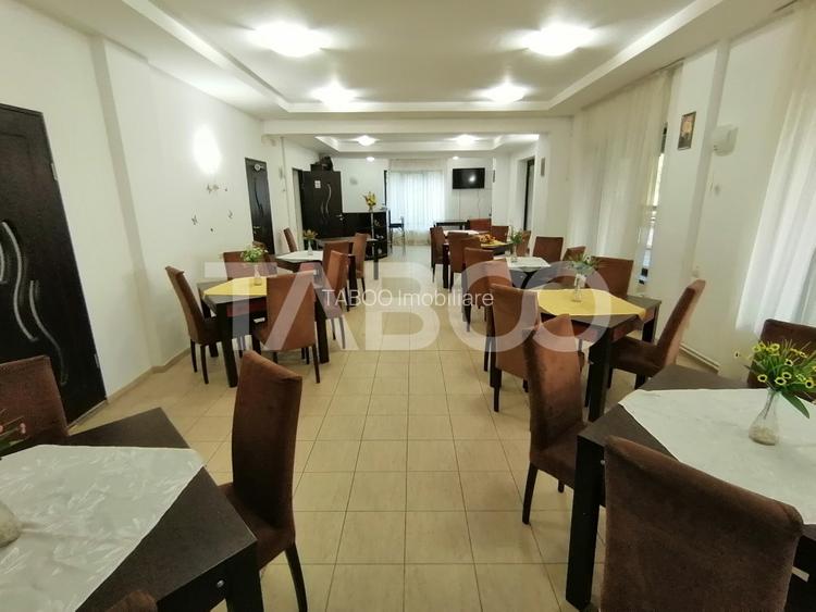 Pensiune 13 camere 16 bai sauna piscina si teren 1565 mp Cisnadioara - 39