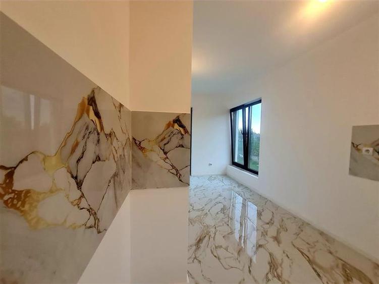 Vila P+E, 5 camere,3 bai,teren 418 mp,finisaje top, intabulata, toate utilitatil