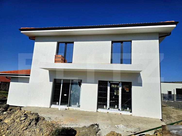Casă individuală în Chinteni, 120 mp utili, teren de 500 mp, garaj