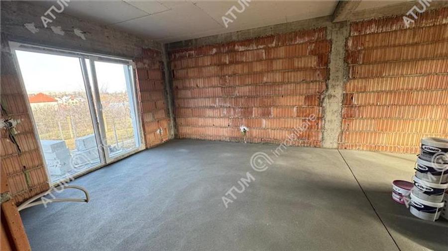 Casa individuala 4 camere 2 bai 120 mp utili 300 mp teren in Sura Mica