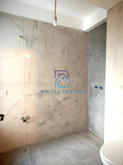 Mogosoaia, zona Livezilor, casa P+2E, 4 camere, 4 bai, teren 350mp - 14