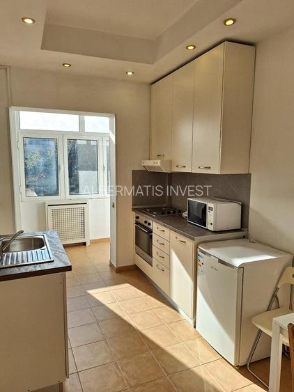 Vinzare apartament renovat cu design italian in  Piata Romana - 11