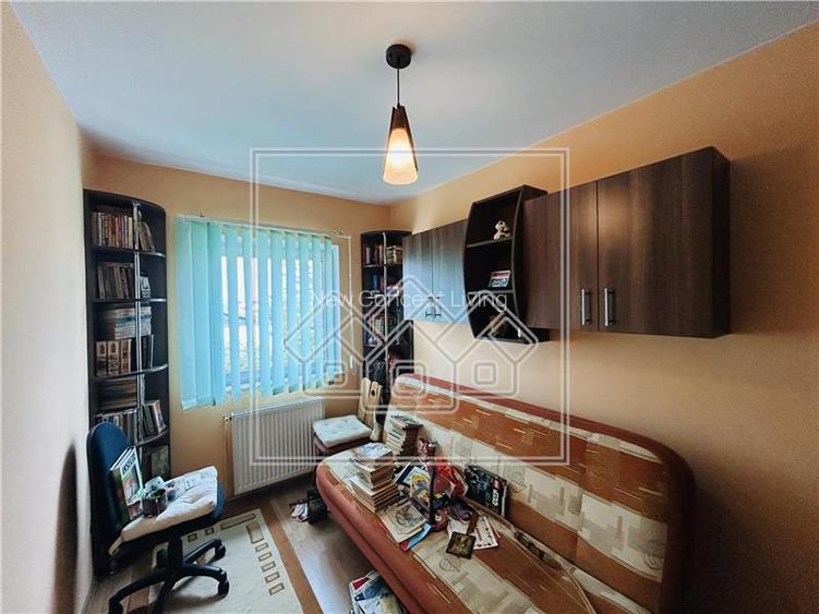 Apartament de vanzare in Sibiu - 3 camere, 2 balcoane + pivnita - - 8