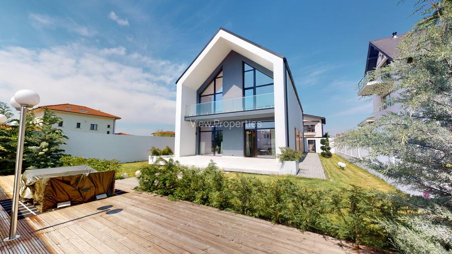 Vilă Modernă cu Atmosferă Caldă și Finisaje High-End, aproape de București - 9