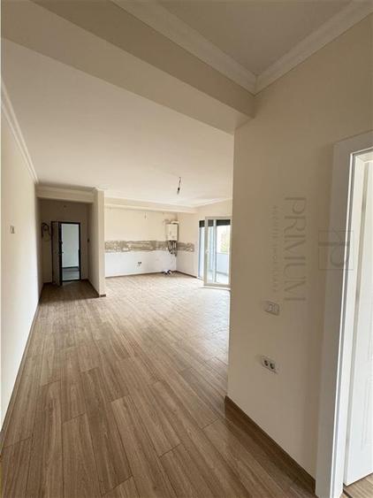 BRAYTIM - 2 CAMERE - ETAJUL 1 - RULOURI ELECTRICE - PARCARE INCLUSA - FINISAJE D
