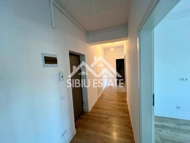 Apartament cu 3 camere, 2 bai, boxa 20 mp. loc de parcare -Finisat la cheie - 5
