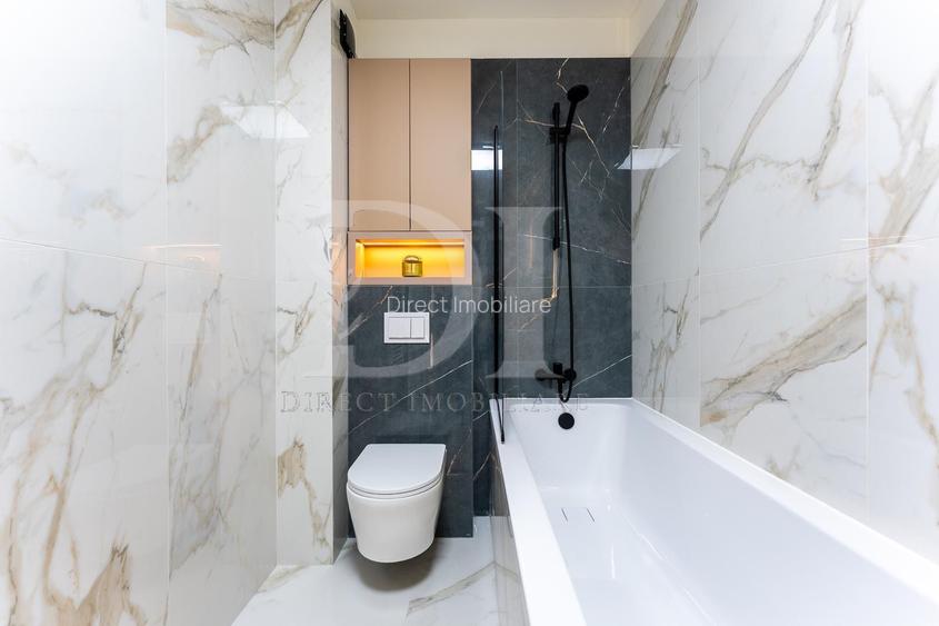 Apartament ultrafinisat / etaj intermediar / Zona Terra - 23