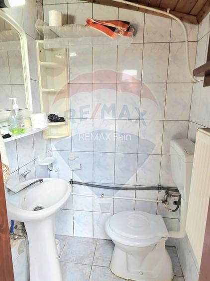 Casa cu 5 camere de vanzare in centrul orasului Talmaciu - 57