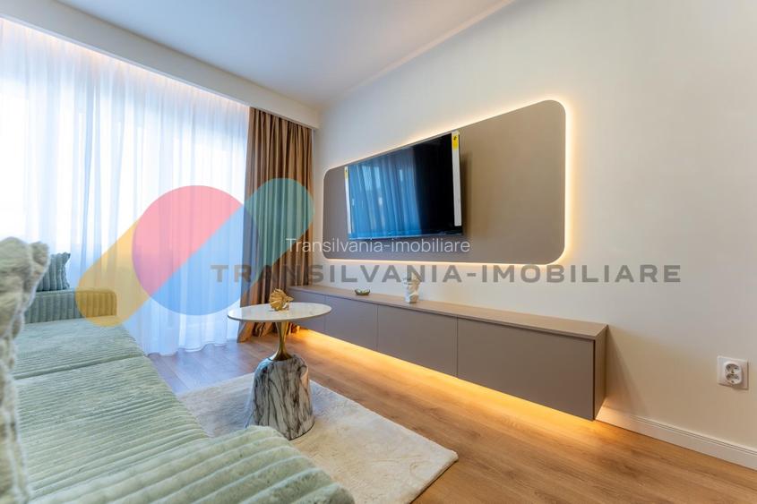 Apartament 56mp, balcon, finisat, zona Floresti - 2