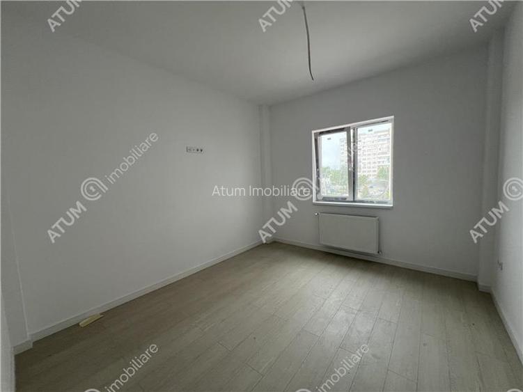 Apartament de 3 camere cu 2 bai etaj intermediar zona Rahovei - 6