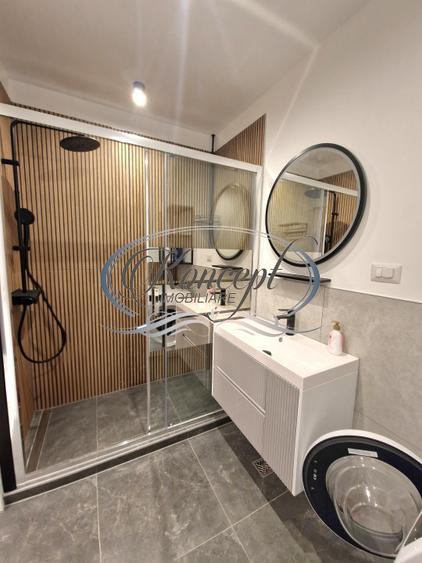 Apartament mobilat cu parcare subterana si terasa