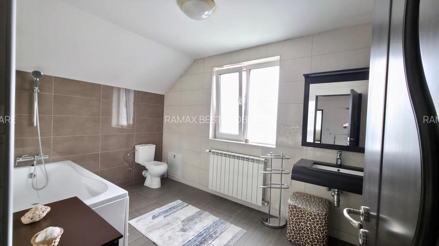 Casă individuală cu 4 dormitoare, grădină 850 mp și garaj dublu - 16