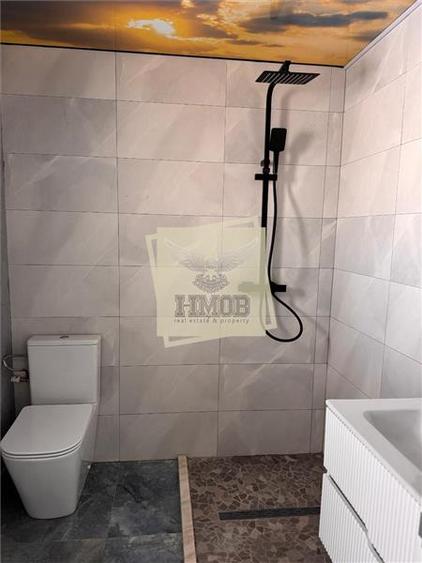 Casa cu 4 camere si 3 bai pretabila birouri in Sura Mare