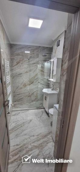 Apartament 2 camere balcon si parcare , la intrare in Floresti