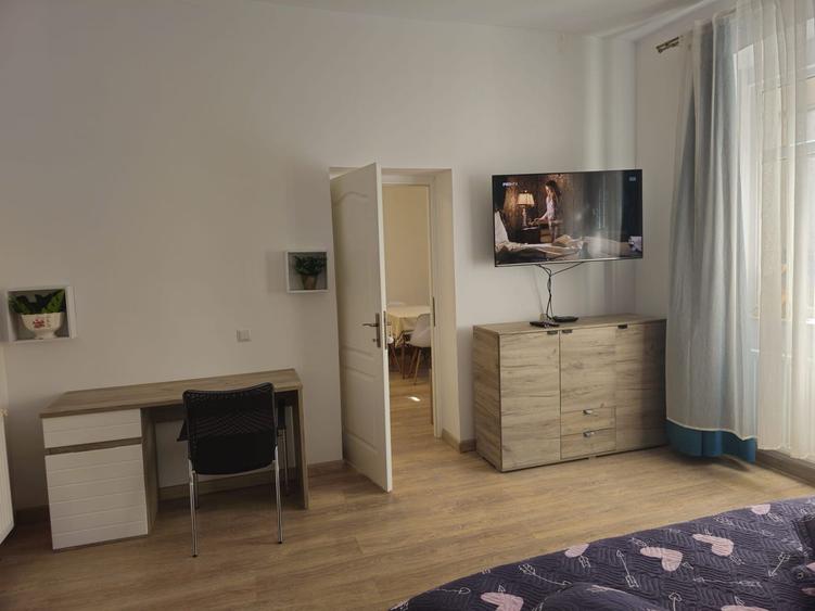 Casa finisata la curte comuna, 56 mp, 2 camere - zona Centrala