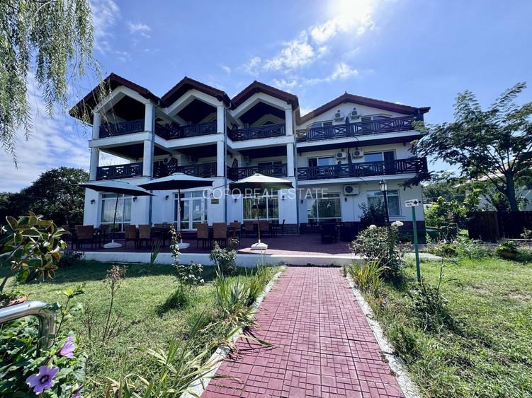 Hotel 20 camere Delta Dunarii 50 m deschidere teren 6000 mp acces auto - 6