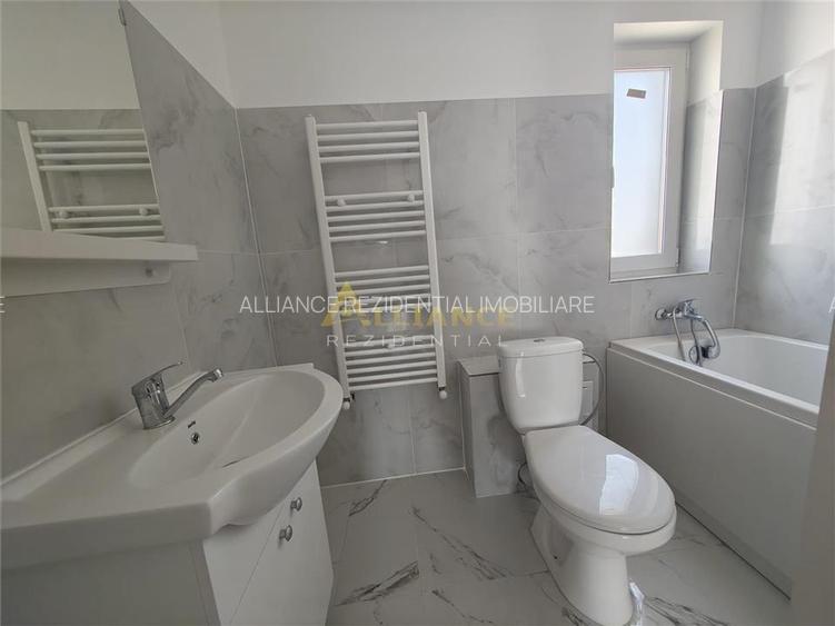 Casa tip duplex - 3 camere - 2 bai - 9