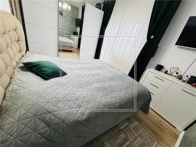 Apartament de vanzare in Sibiu - 66 mp utili, 2 balcoane - Etaj 1/4 - 18