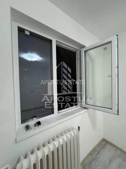 Garsoniera 12 mp renovata, zona Dambovita - 3