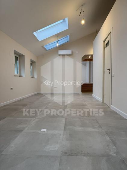 Piata Romana, mansarda boema, finisaje in linii simple si elegante - 2