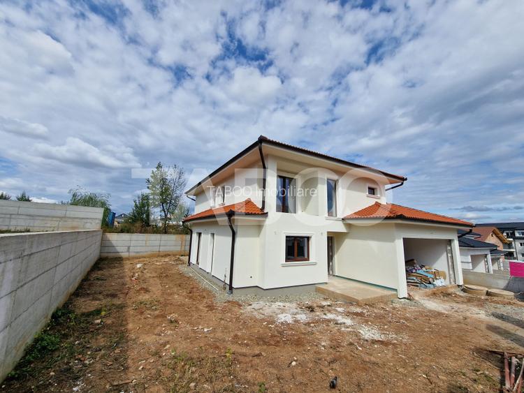 Casa individuala de vanzare cu teren, terasa, garaj si curte Selimbar - 2